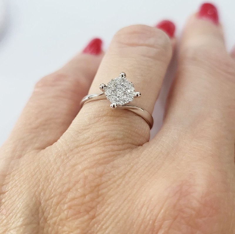 Anello solitario magic a 4 griffe in Oro Bianco con Diamanti 0,42 ct 18 kt (750)