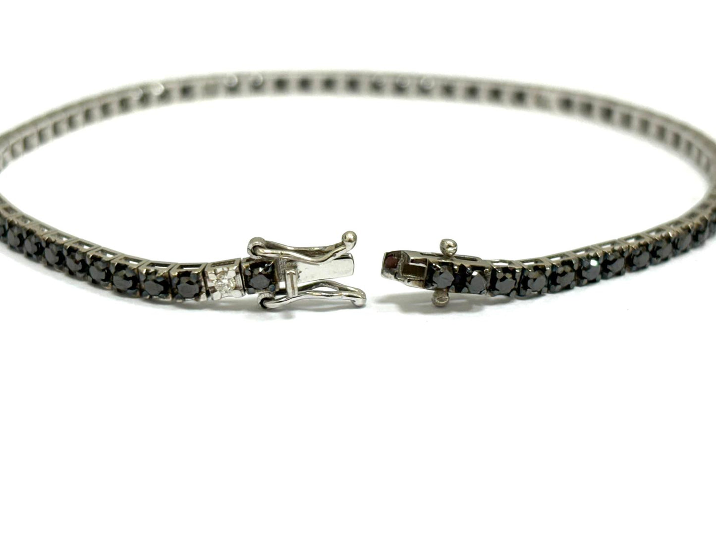 Bracciale tennis piramidale Astralia diamanti neri 3,25 e bianchi 0,20 ct in Oro Bianco 18 kt