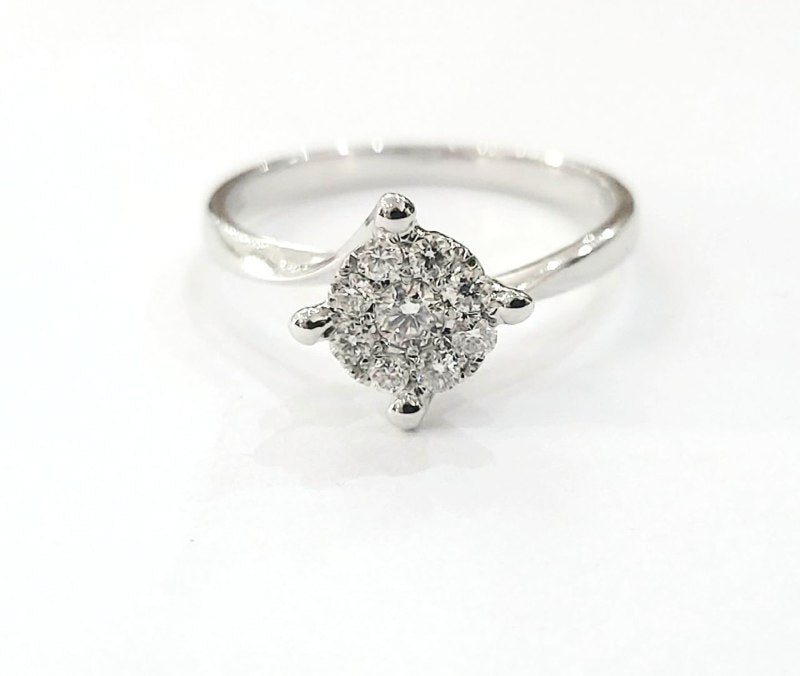 Anello solitario magic a 4 griffe in Oro Bianco con Diamanti 0,42 ct 18 kt (750)