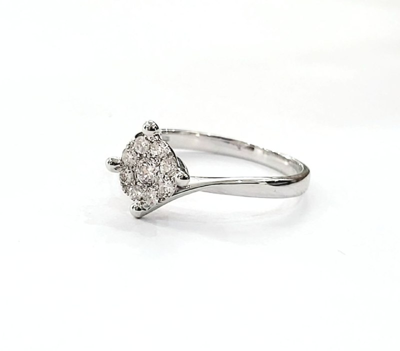 Anello solitario magic a 4 griffe in Oro Bianco con Diamanti 0,42 ct 18 kt (750)