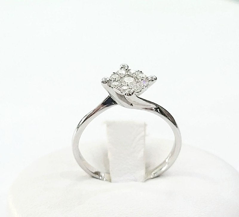 Anello solitario magic a 4 griffe in Oro Bianco con Diamanti 0,42 ct 18 kt (750)