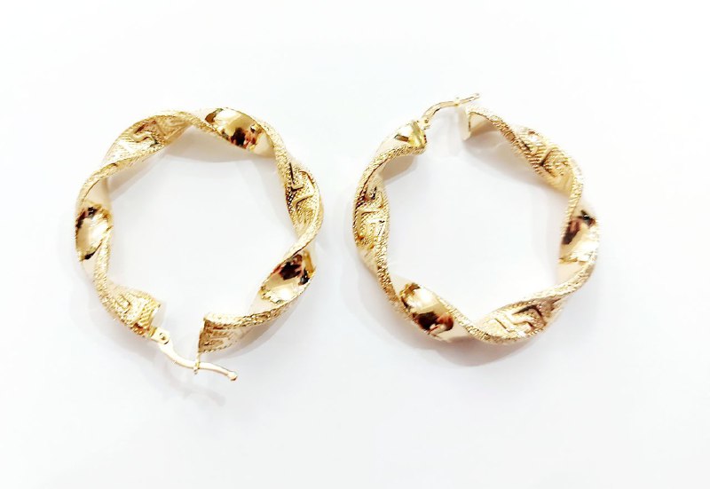 Orecchini torchon con greca in oro 18 kt - Oreficeria