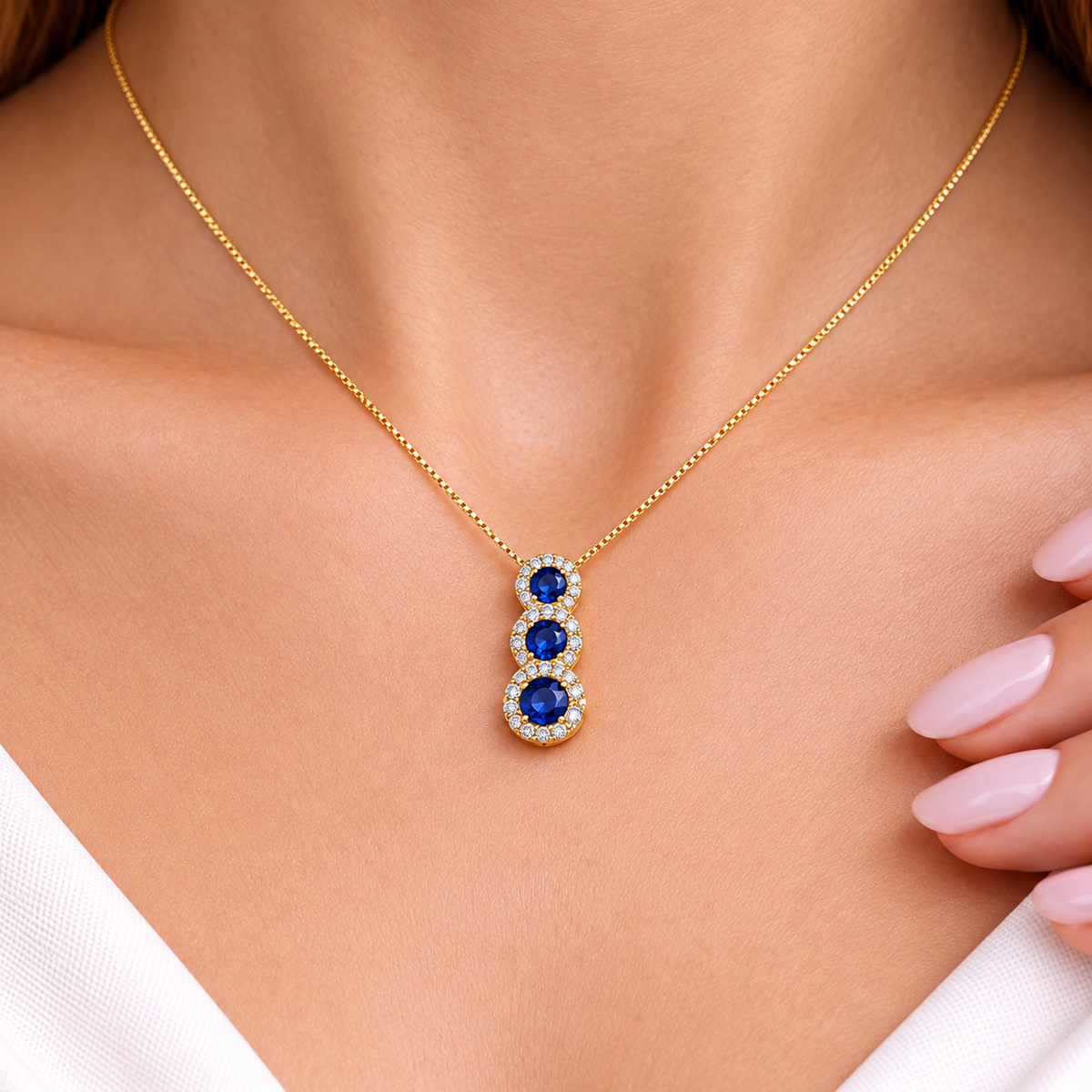 Collana trilogy magic con zaffiro ct 0,30 e diamanti ct 0,22 in oro giallo 18kt (750)
