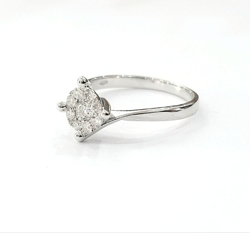 Anello solitario magic a 4 griffe in Oro Bianco con Diamanti 0,42 ct 18 kt (750)
