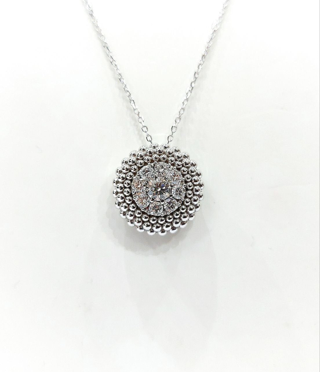 Collana pendente tondo Astralia con Diamante centrale e circolari 0,84 ct in Oro Bianco 18 kt -750