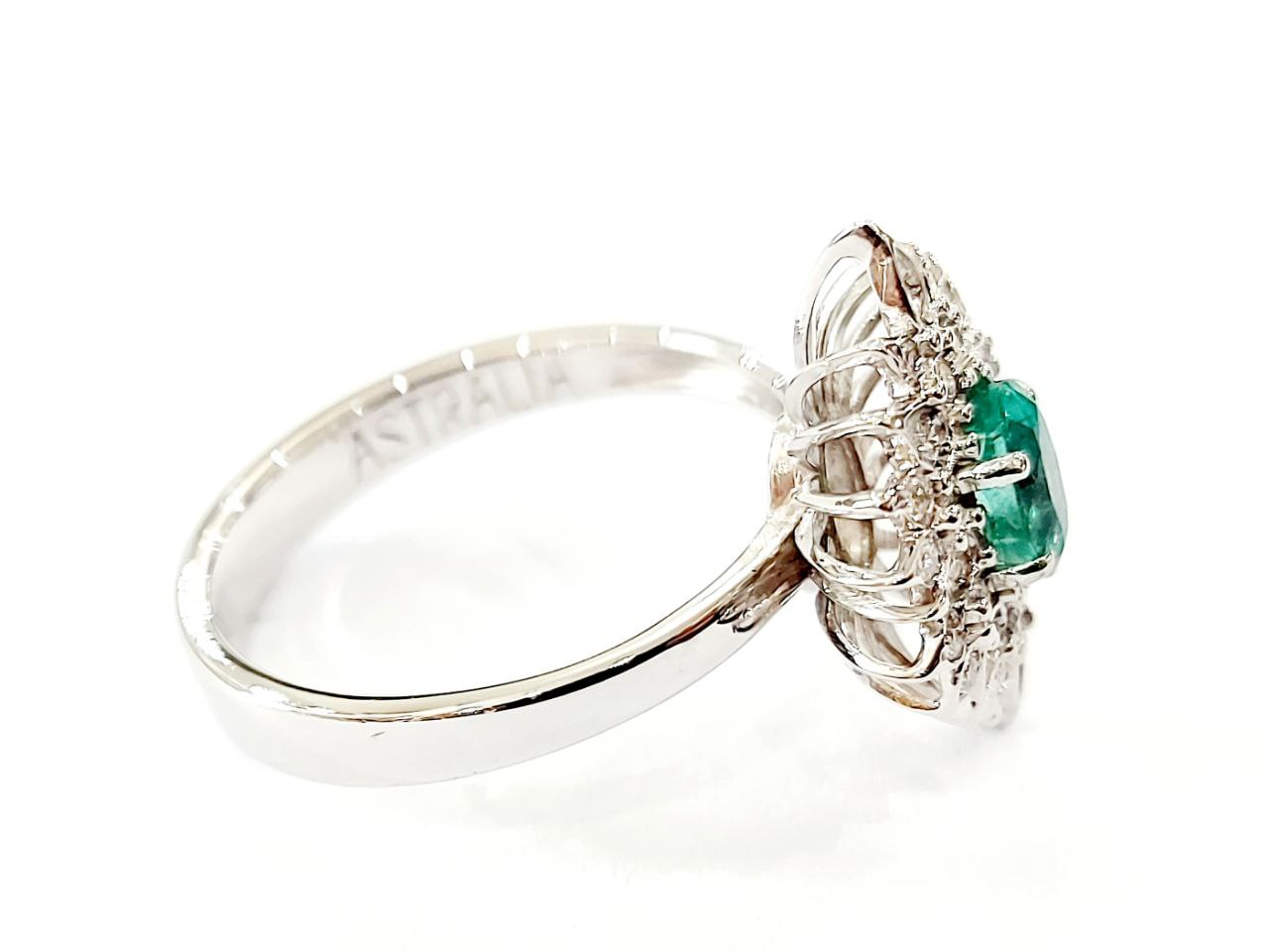 Anello stella Astralia Smeraldo 0,70 ct e contorno di Diamanti 0,30 ct in Oro Bianco 18kt (750)