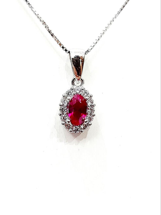 Collana pendente Donna  Rubino ovale 0,55 ct  Diamanti 0,15 ct  Oro Bianco18 kt-750