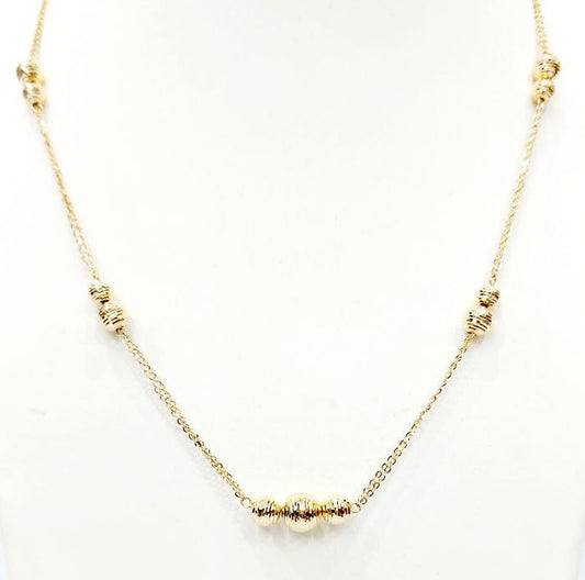 Collana con sfere sfacettatte in oro 18 kt  - Oreficeria