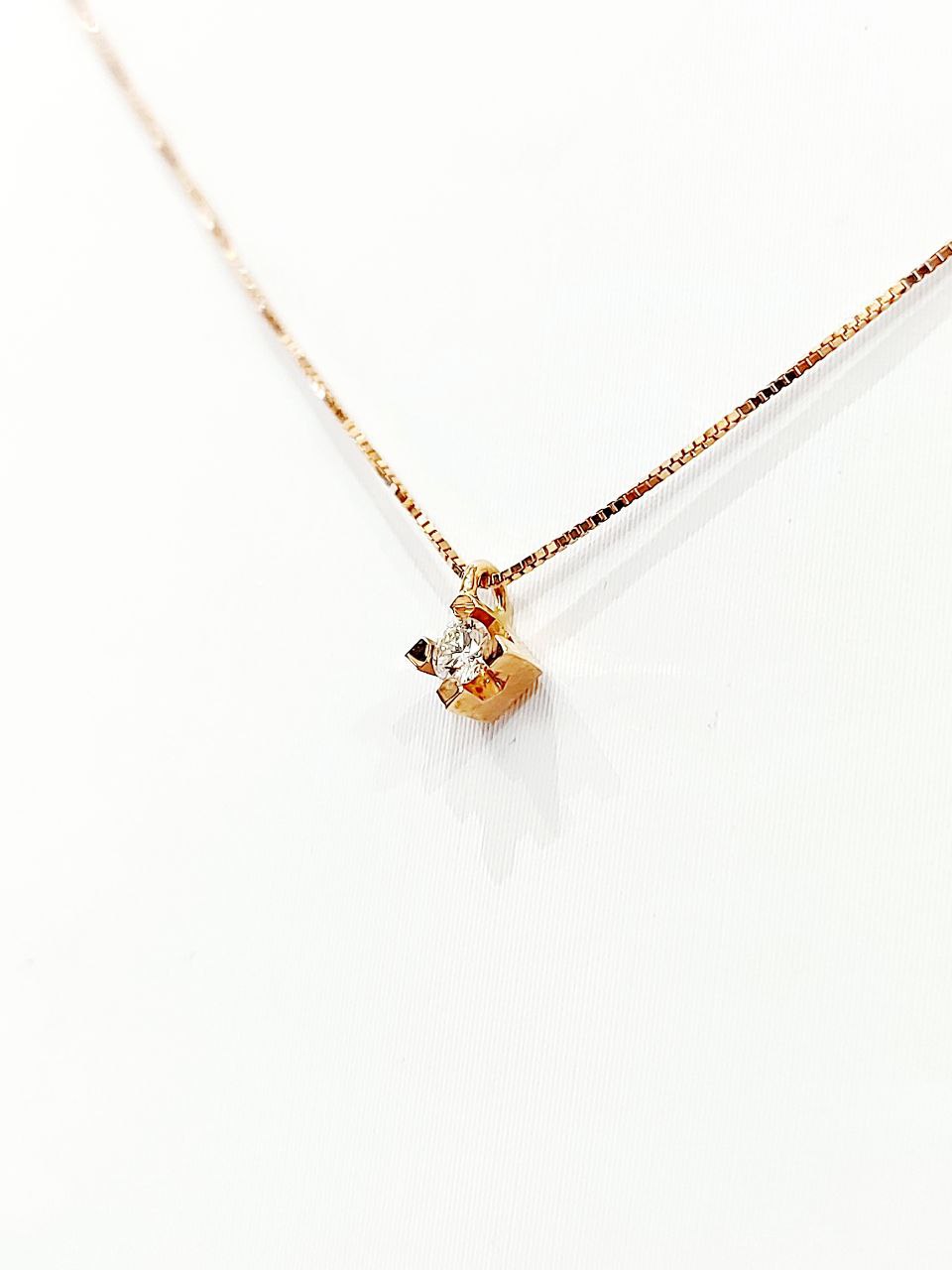Collana con pendente punto luce in Oro Rosa con Diamante 0,15 ct 18 kt (750)