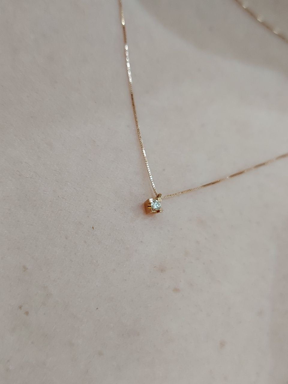 Collana con pendente punto luce in Oro Rosa con Diamante 0,15 ct 18 kt (750)