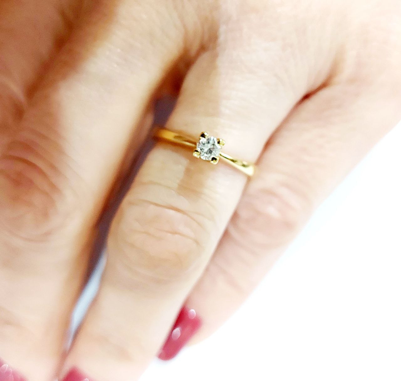 Anello Solitario modello 4 griffe con Diamante 0,25 ct in Oro Giallo 18 kt (750)