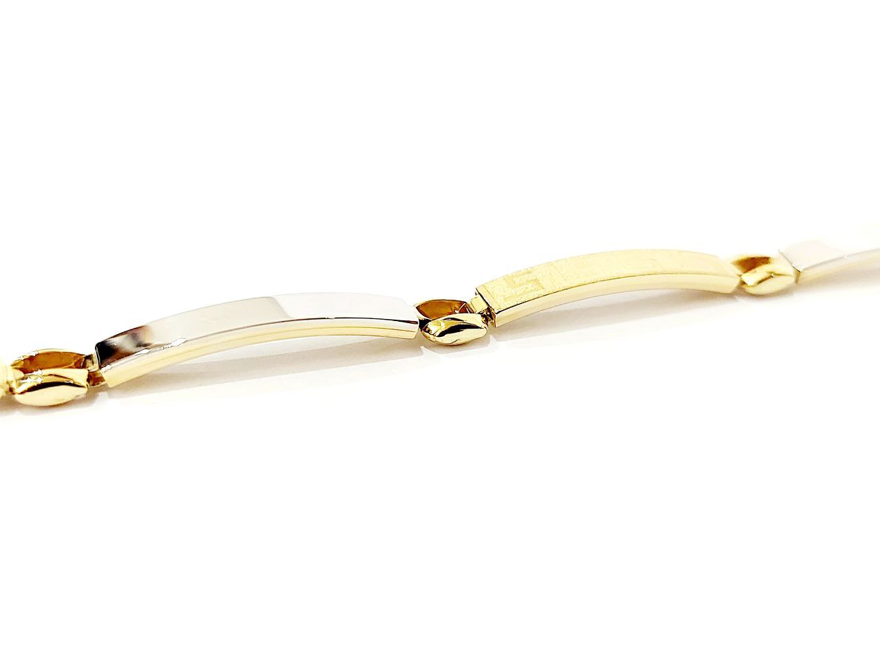 Bracciale Oro bianco e Oro Giallo 18 kt (750) targhette con greca lavorate - Oreficeria