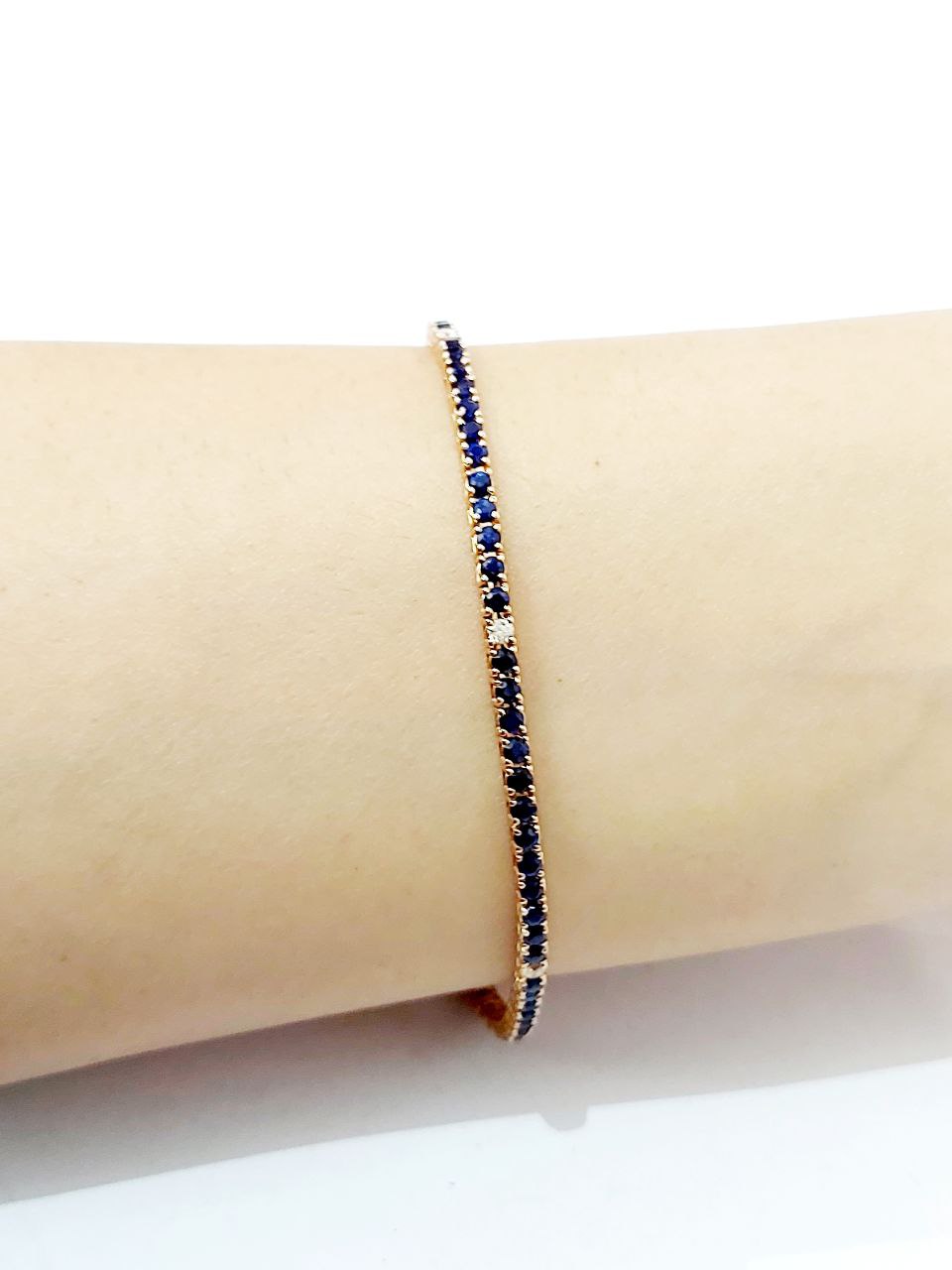 Bracciale modello Tennis Oro Rosa 18kt-750 Diamanti ct 0,27 ct e Zaffiri blu 4,54 ct