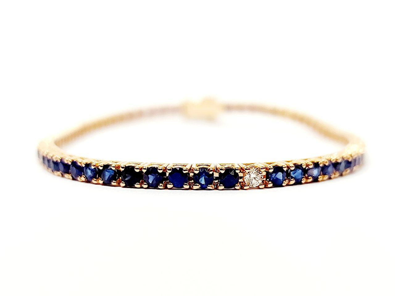 Bracciale modello Tennis Oro Rosa 18kt-750 Diamanti ct 0,27 ct e Zaffiri blu 4,54 ct