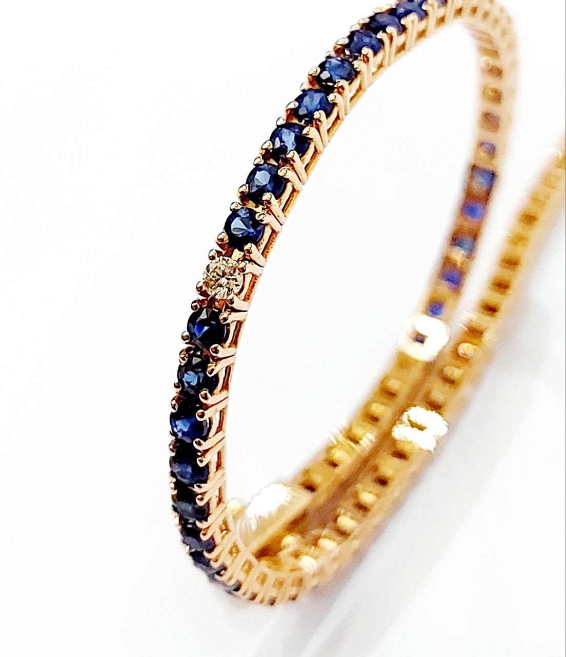 Bracciale modello Tennis Oro Rosa 18kt-750 Diamanti ct 0,27 ct e Zaffiri blu 4,54 ct
