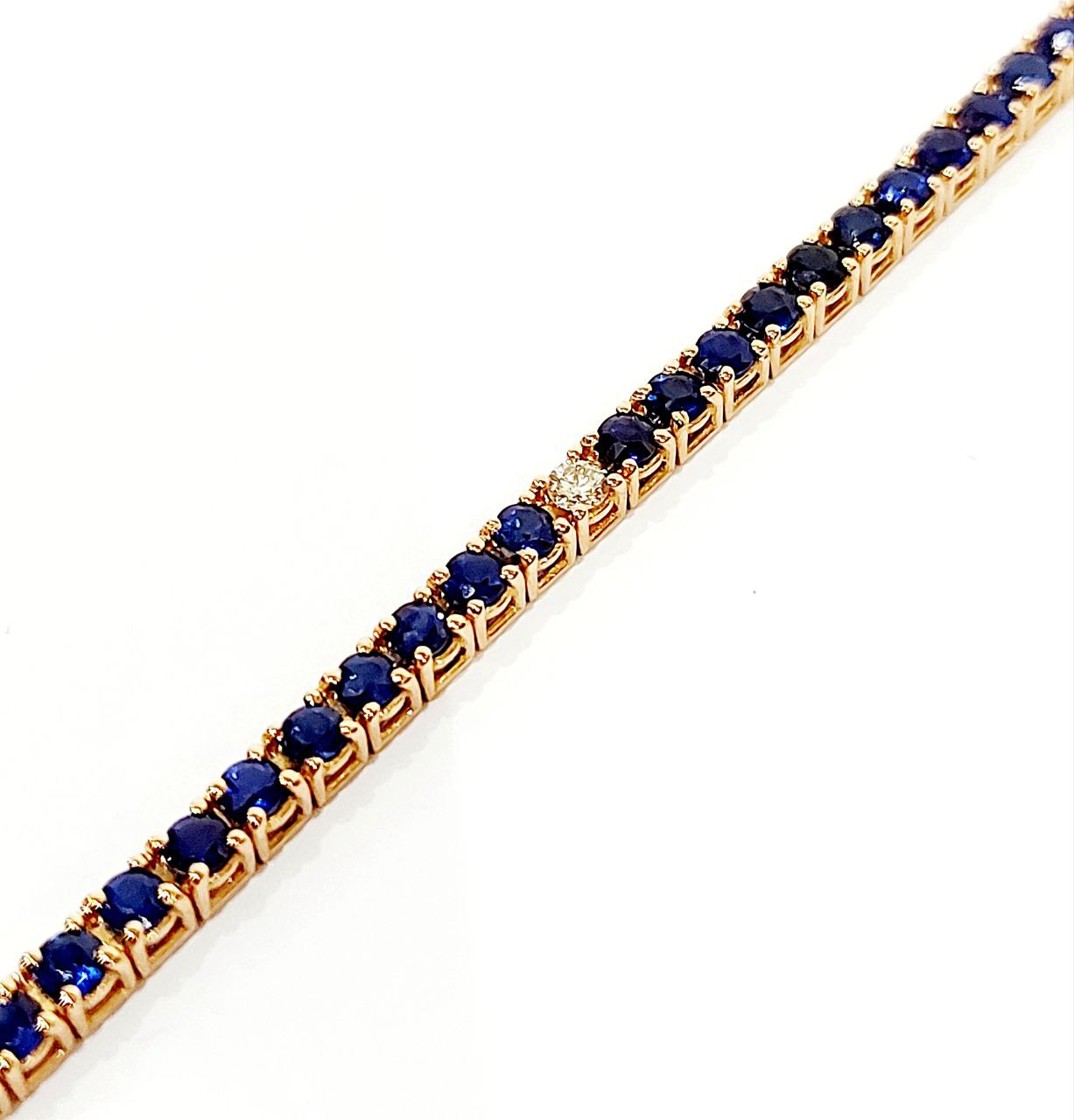 Bracciale modello Tennis Oro Rosa 18kt-750 Diamanti ct 0,27 ct e Zaffiri blu 4,54 ct