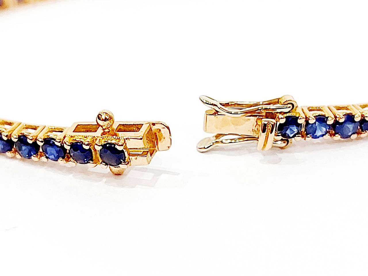 Bracciale modello Tennis Oro Rosa 18kt-750 Diamanti ct 0,27 ct e Zaffiri blu 4,54 ct