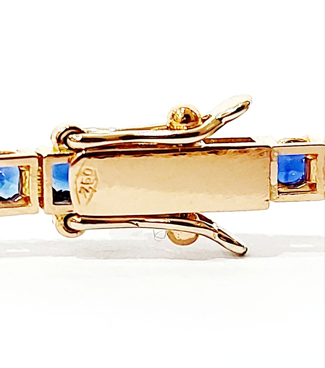 Bracciale modello Tennis Oro Rosa 18kt-750 Diamanti ct 0,27 ct e Zaffiri blu 4,54 ct