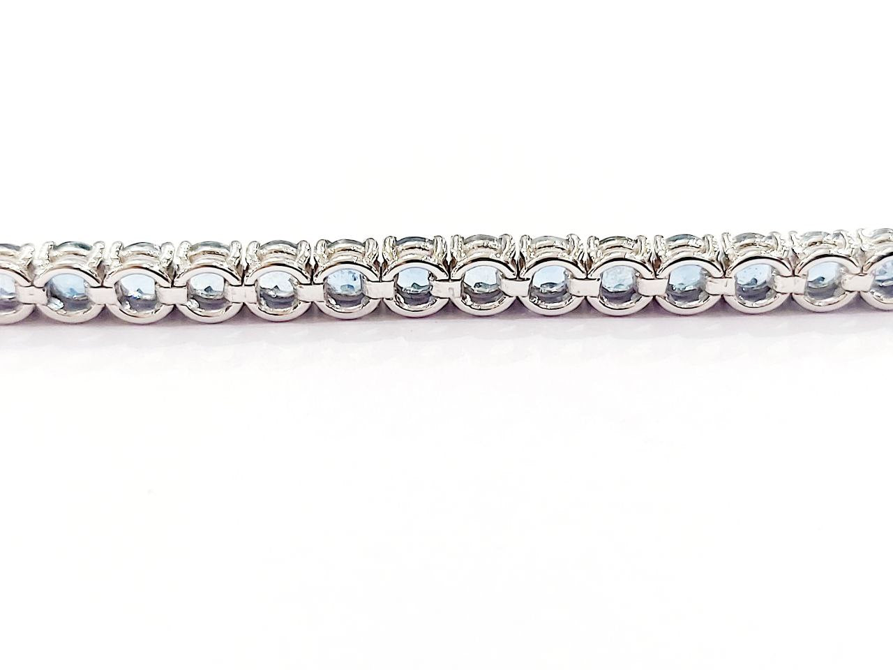 Bracciale Tennis filo tondo Unisex Oro 18kt-750 -18 cm con Acquamarina Ct 8,20