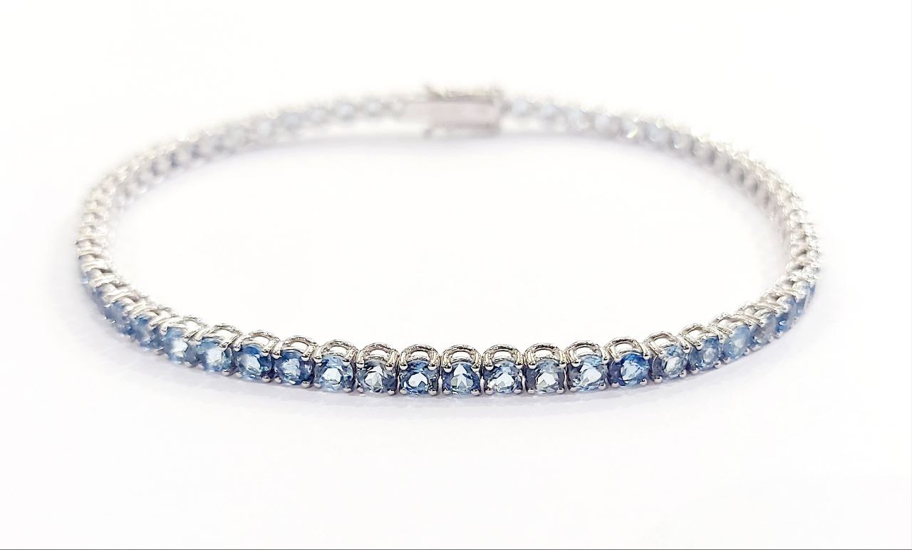 Bracciale Tennis filo tondo Unisex Oro 18kt-750 -21cm con Acquamarina Ct 7,00