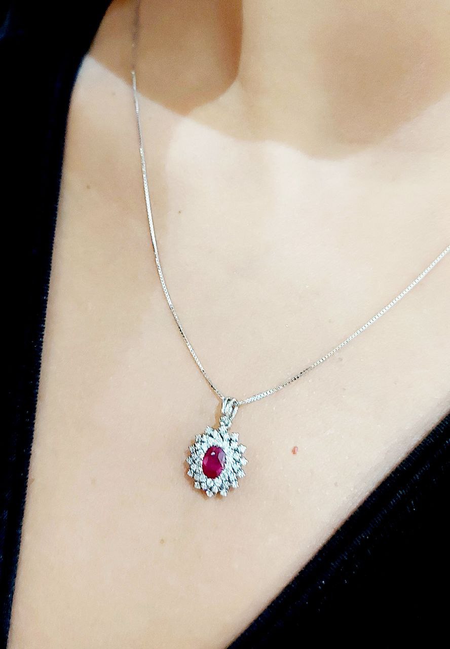 Collana con pendente fantasia con Zaffiro Ovale ct 0,73 e Diamanti ct 0,28