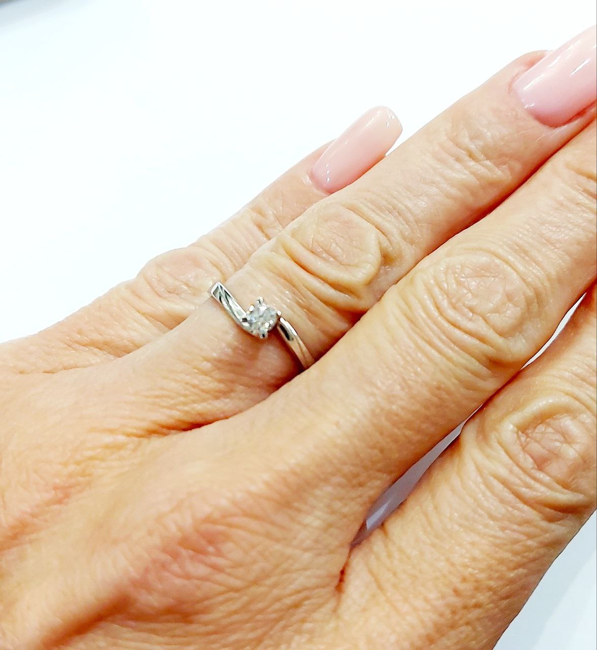 Anello solitario con Diamanti ct 0,20 Oro Bianco 18kt-750