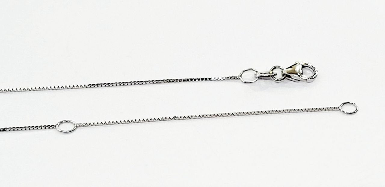 Collana pendente modello fantasia Diamanti 0,30 ct Smeraldo 0,42 ct in Oro Bianco 18kt - 750