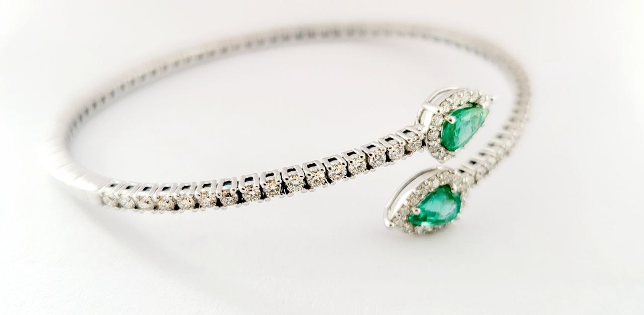 Bracciale Donna a molla contrariè Astralia Smeraldi ct 0,77 e Diamanti ct 0,92 Oro Bianco 18kt-750