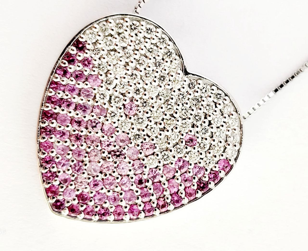 Collana cuore in pave' Oro bianco 18kt-750 con Diamanti ct 0,71 e Zaffiro Rosa ct 0,60