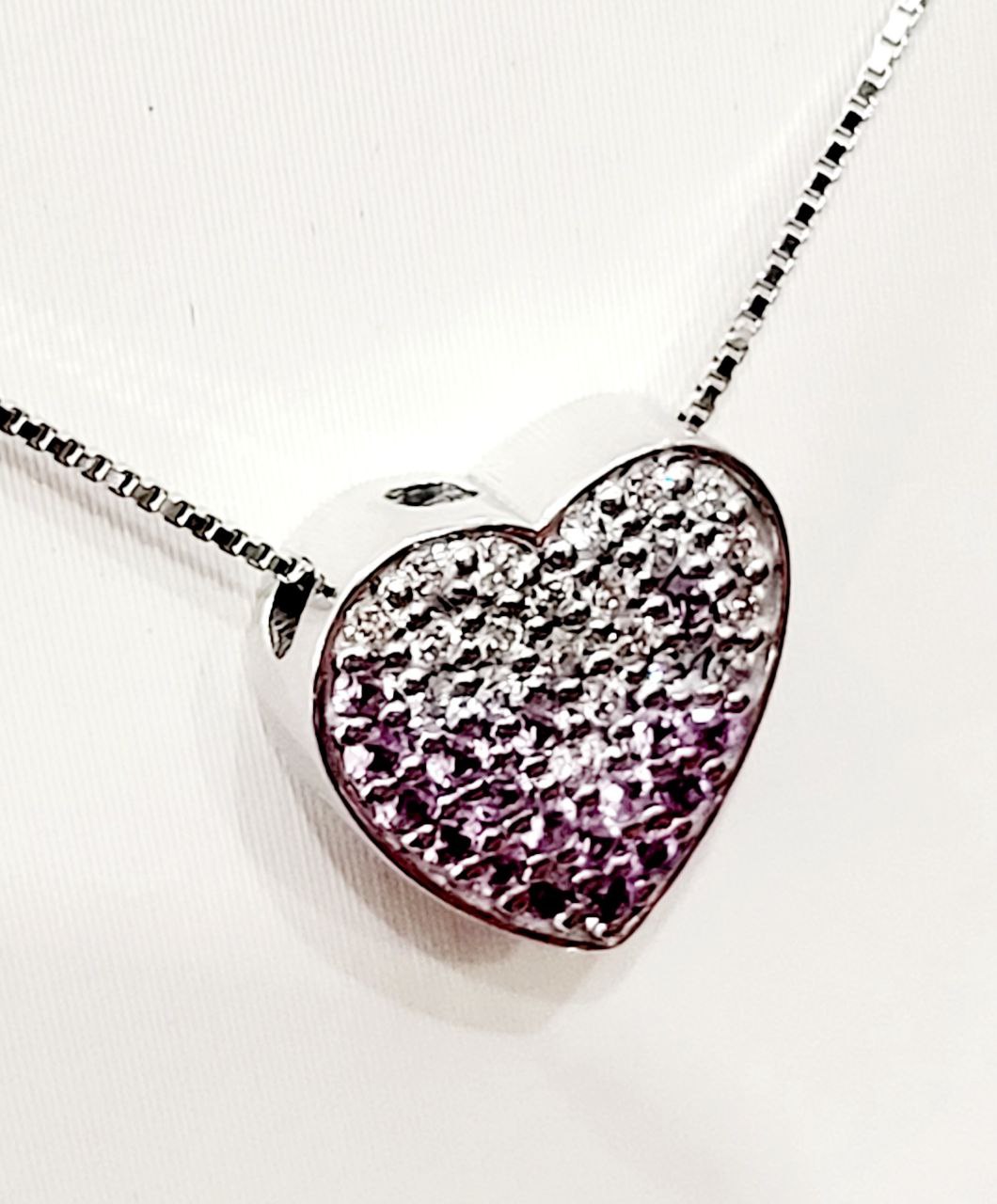 Collana cuore in pave' Oro bianco 18kt-750 con Diamanti ct 0,25 e Zaffiro Rosa ct 0,20