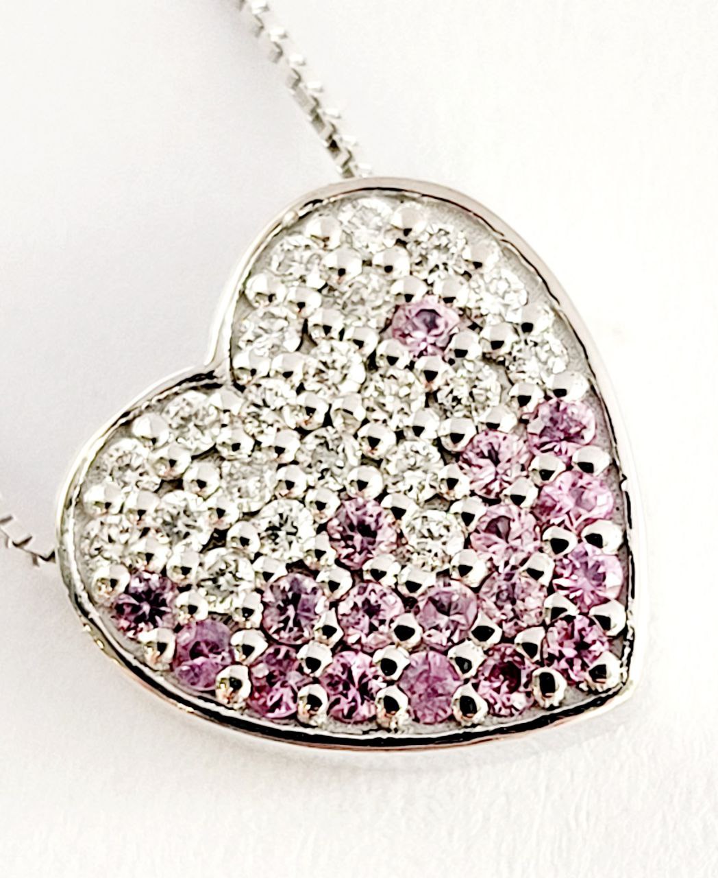 Collana cuore in pave' Oro bianco 18kt-750 con Diamanti ct 0,25 e Zaffiro Rosa ct 0,20