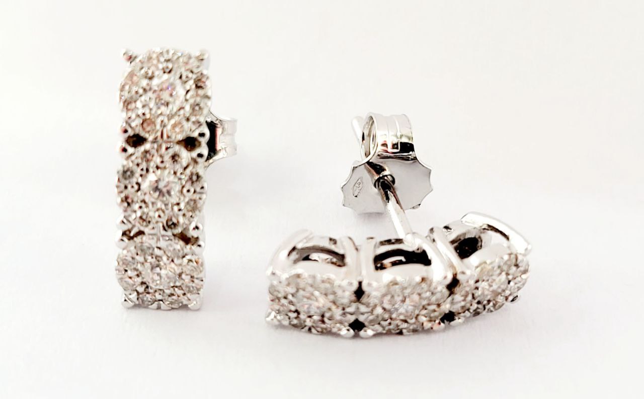 Orecchini modello magic trilogy curvi in Oro bianco 18kt-750 con Diamanti ct 0,55