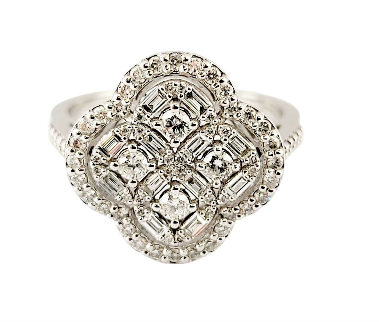 Anello Astralia a fiore in Oro Bianco con Diamanti Baguette ct 0,20 e Brillante ct 0,65 18kt (750)