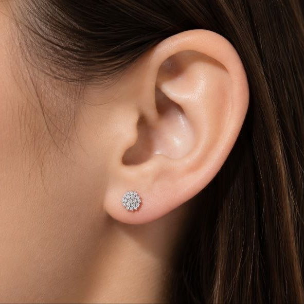 Orecchini bottone con Diamanti ct 0.61 in oro bianco 18kt (750)