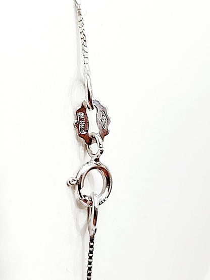 Collana e pendente punto luce a cipollina in Oro Bianco con Diamante 0,10 ct 18 kt (750)