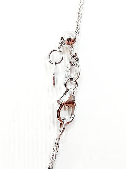 Collana pendente Croce  con Diamanti 0,90 ct e Smeraldi Baguette 2,10 ct in Oro 18 kt (750)