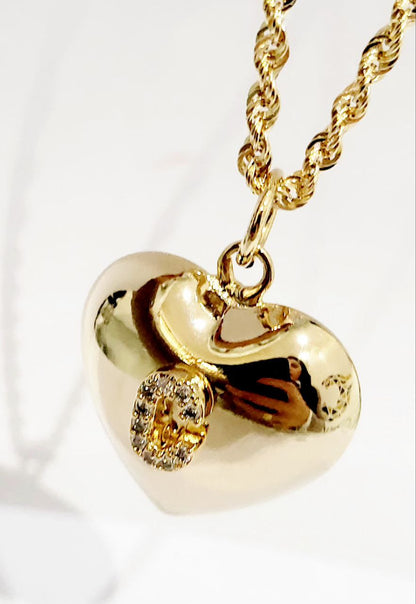 Collana cuore bombato in oro 18 kt con lettera personalizzata in diamanti ct 0,14
