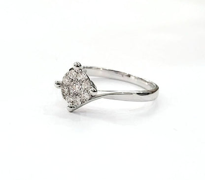Anello solitario magic a 4 griffe in Oro Bianco con Diamanti 0,42 ct 18 kt (750)