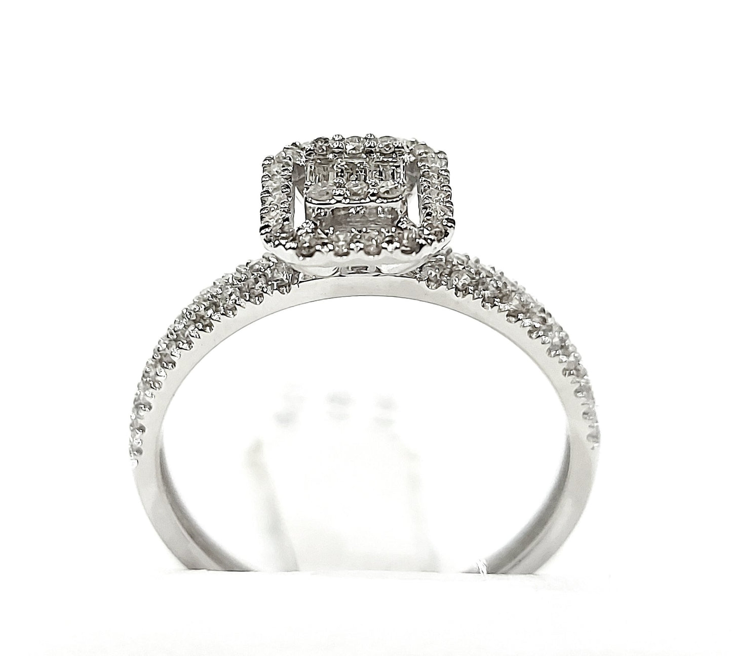 Anello Astralia a fantasia in Oro Bianco con Diamanti Baguette ct 0,09 e Brillante ct 0,45 18kt (750)