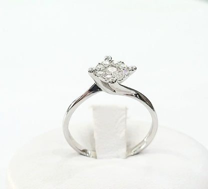 Anello solitario magic a 4 griffe in Oro Bianco con Diamanti 0,42 ct 18 kt (750)