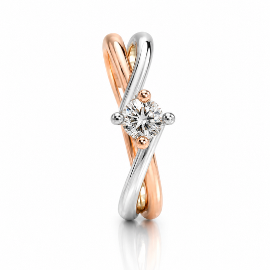 Anello solitario con diamante ct 0,40 in oro bianco e rosa 18Kt (750)