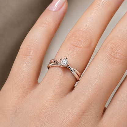 Anello solitario con diamante ct 0,40 in oro bianco e rosa 18Kt (750)