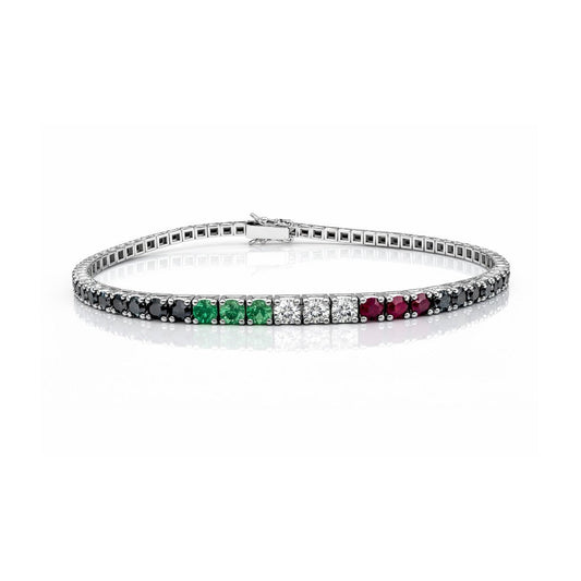 Bracciale tennis con diamanti neri ct 4,55 - diamanti bianchi ct 0,18 - rubini ct 0,24 - smeraldi ct 0,19 in oro bianco 18kt (750)