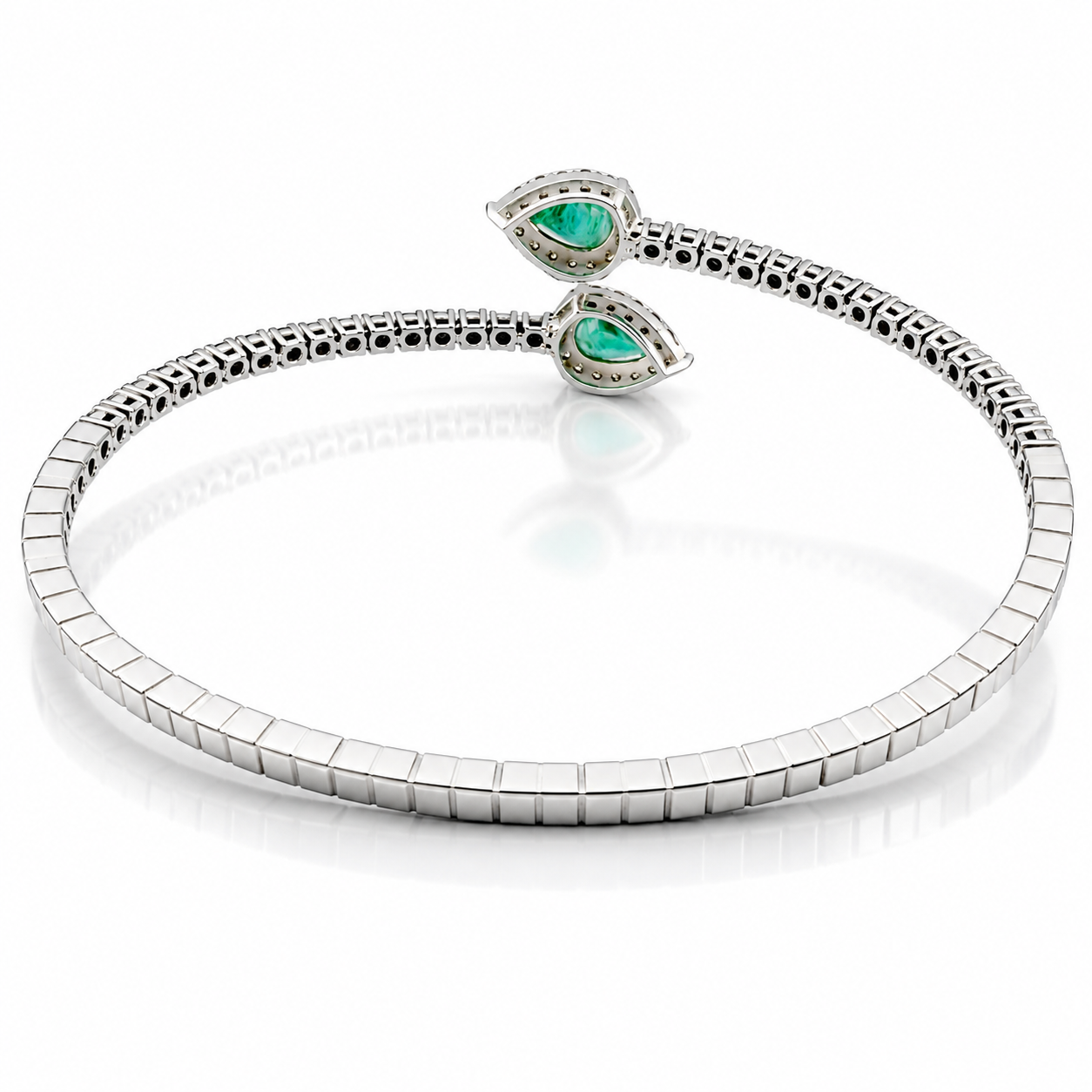 Bracciale contrarié Astralia con smeraldi ct 0,77 a goccia e diamanti ct 0,92 in oro bianco 18kt (750)