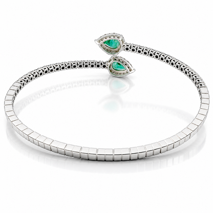 Bracciale contrarié Astralia con smeraldi ct 0,77 a goccia e diamanti ct 0,92 in oro bianco 18kt (750)