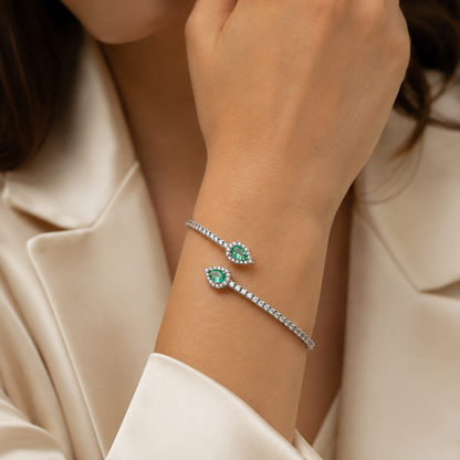 Bracciale contrarié Astralia con smeraldi ct 0,77 a goccia e diamanti ct 0,92 in oro bianco 18kt (750)