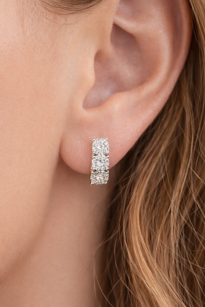Orecchini modello magic trilogy curvi con Diamanti ct 0,55 in oro bianco 18kt (750)