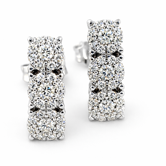 Orecchini modello magic trilogy curvi con Diamanti ct 0,55 in oro bianco 18kt (750)