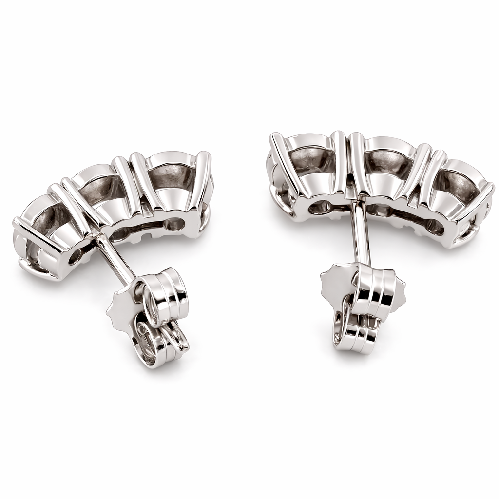 Orecchini modello magic trilogy curvi con Diamanti ct 0,55 in oro bianco 18kt (750)