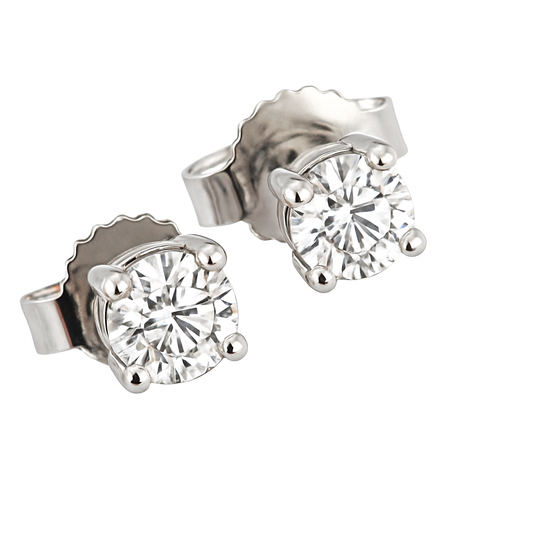 Orecchini punto luce in oro bianco 18k a filo con diamanti ct 0,30